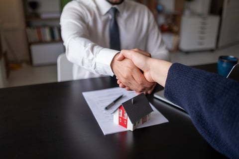 Real estate agents shaking hands